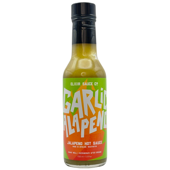 Bottle of Garlic Jalapeno hot sauce with a colorful label on a white background