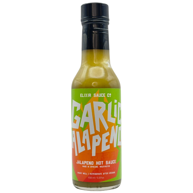 Bottle of Garlic Jalapeno hot sauce with a colorful label on a white background