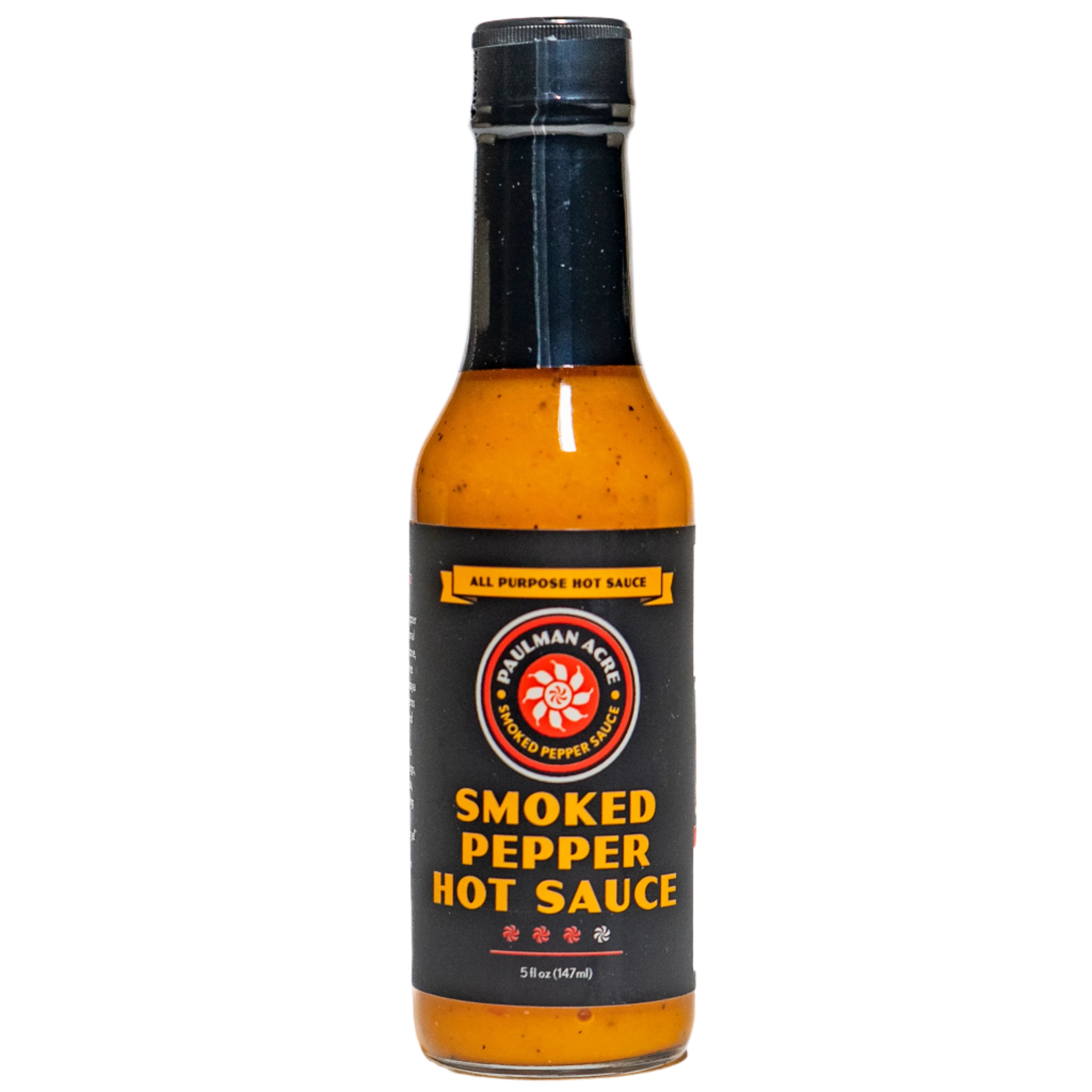 Bottle of smoked pepper hot sauce on a white background