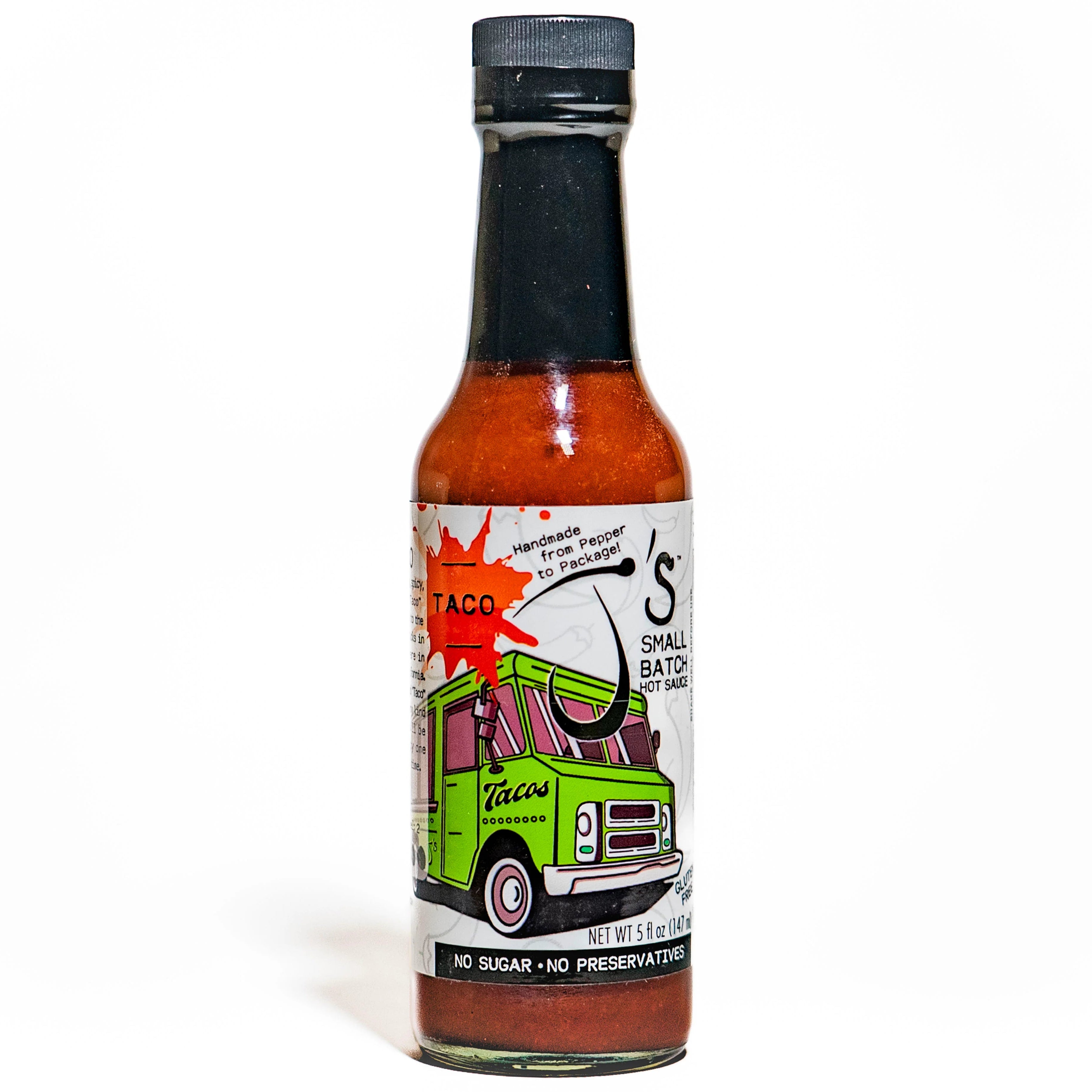 Hot sauce bottle with a colorful label on a white background
