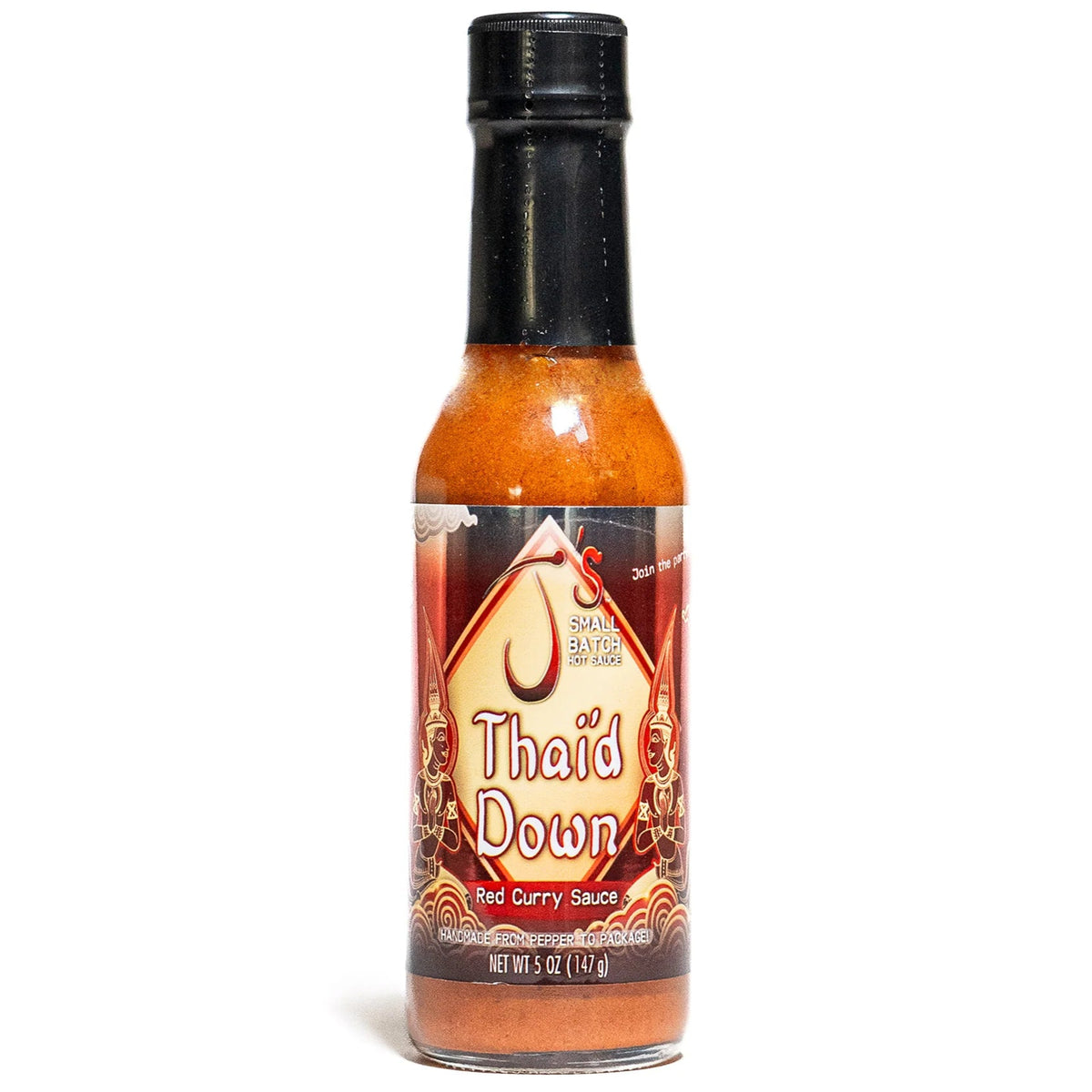 A bottle of J's Thai'd Down Red Curry Sauce with a label that includes the product name and a depiction of a spicy pepper.